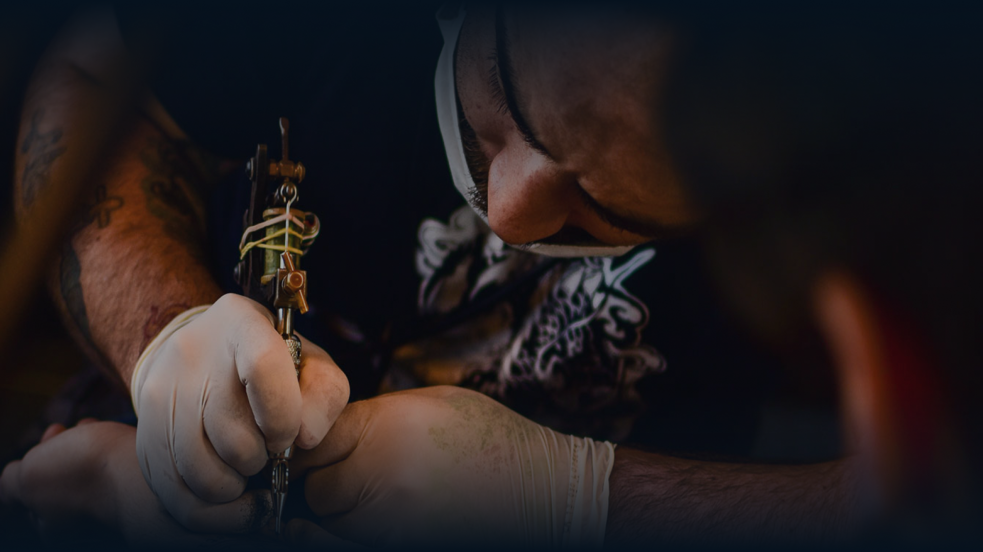 Tattoo artist working
